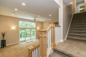    66201-basement-living-room_2_-french-country-traditional-1.5-story-3163-square-feet-4-bedrooms-4-bathrooms