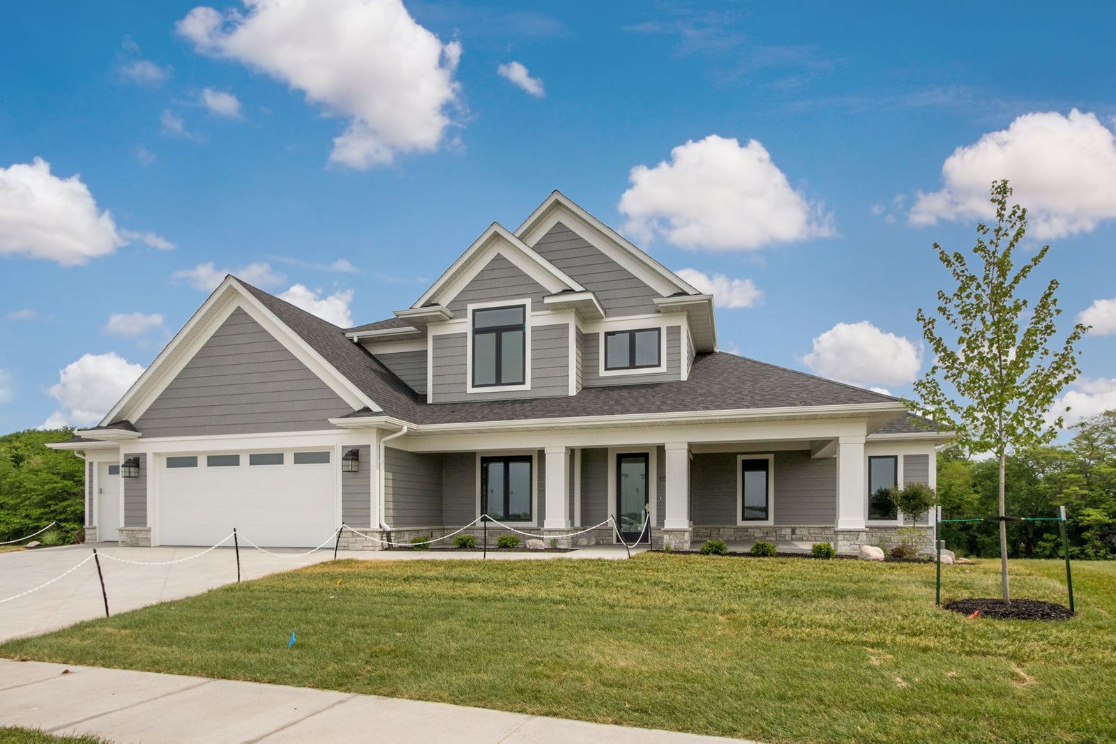 Custom 112 - Traditional Open Concept Two Story House Plan Design