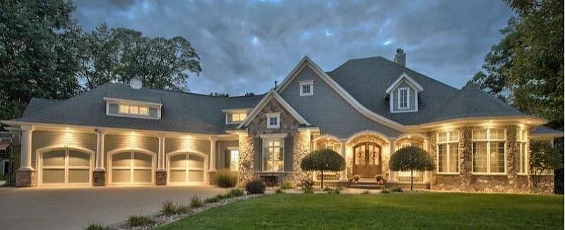        38712-front-dusk-traditional-ranch-house-plans-3109-square-feet