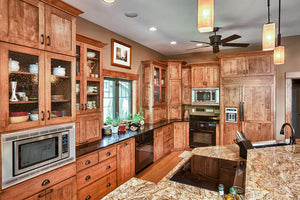 61617LL-kitchen-craftsman-11_2story-house-plan-walkout-basement-4864-square-feet