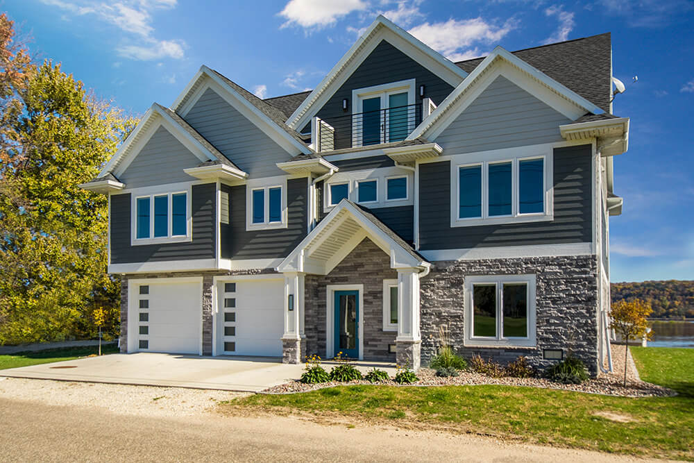 61817LL-FRONT-craftsman-walkout-house-plans-4858-square-feet-5-bedrooms-6-bathrooms