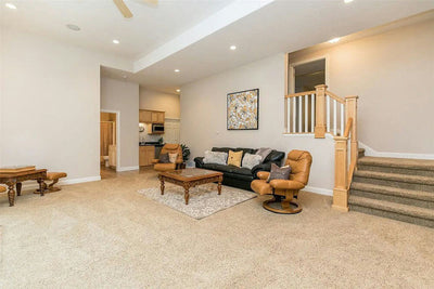    66201-basement-living-room_1_-french-country-traditional-1.5-story-3163-square-feet-4-bedrooms-4-bathrooms