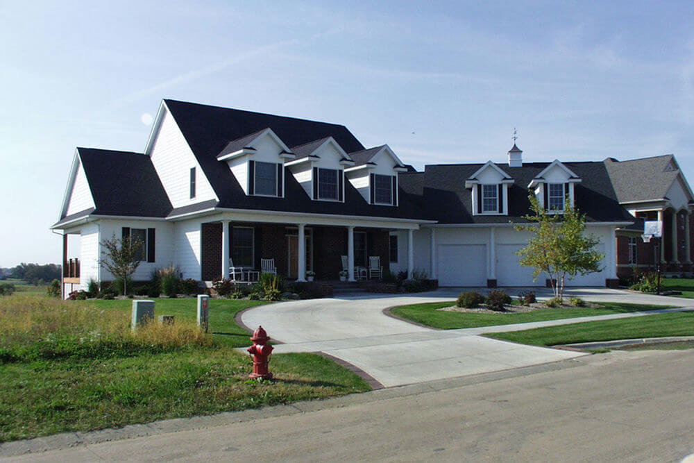    69201-front-country-craftsman-11_2-story-house-plans-angled-garage