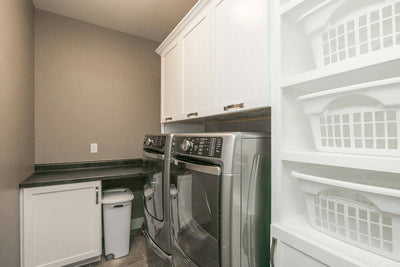    66419LL-laundry-craftsman-ranch-house-plans-walkout-basement-3253-square-feet