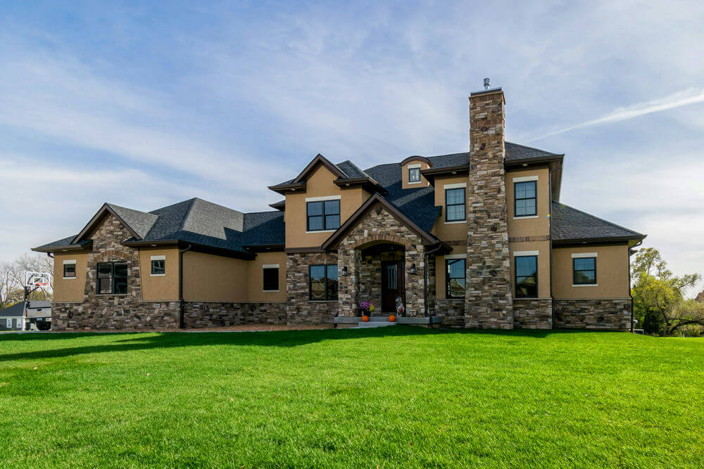 66919LL-front-tuscan-11_2-story-house-plans-walkout-basement-5806-square-feet